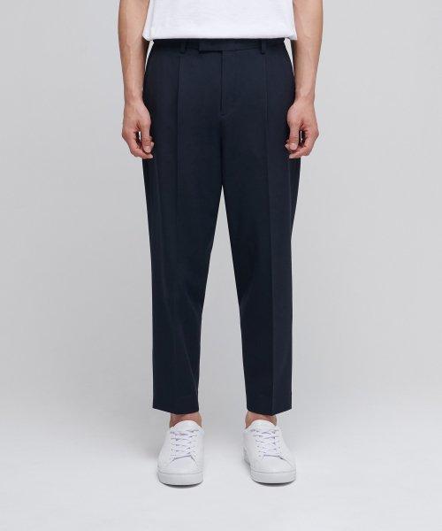 무신사스탠다드 キャロット ヒドゥンバンディング クロップ スラックス ネイビー