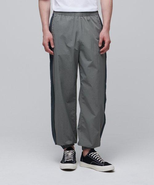 무신사스탠다드 ARMY IPFU Track Pants Gray